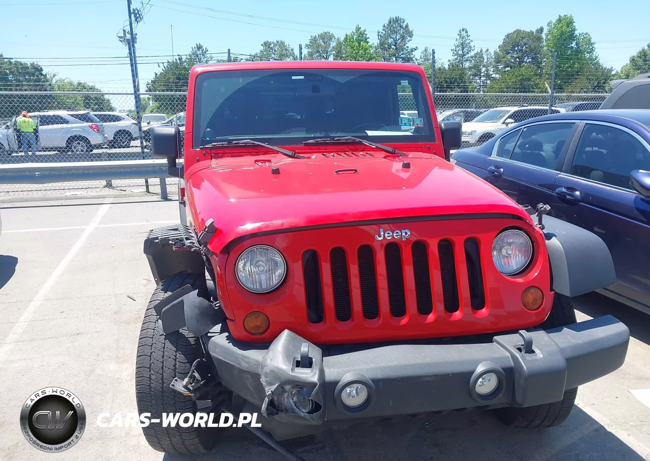2011 Jeep Wrangler Sport VIN:1J4AA2D19BL507054 - 12