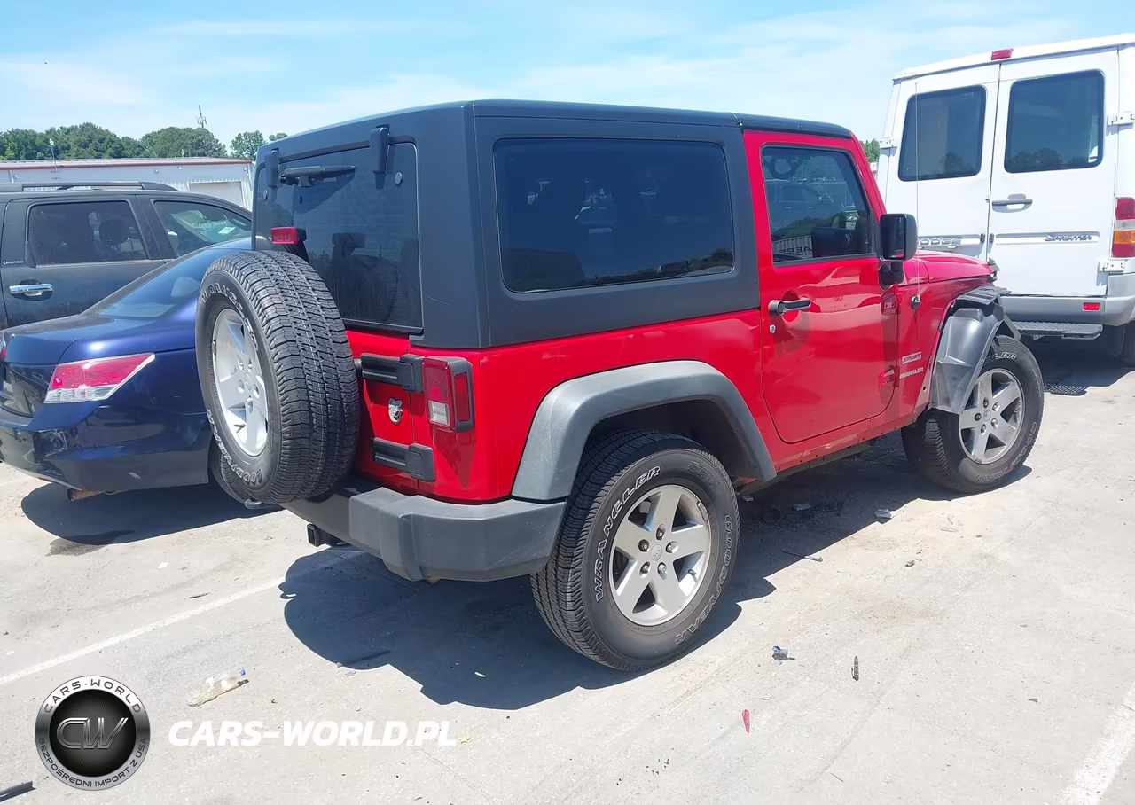 2011 Jeep Wrangler Sport VIN:1J4AA2D19BL507054 - 4