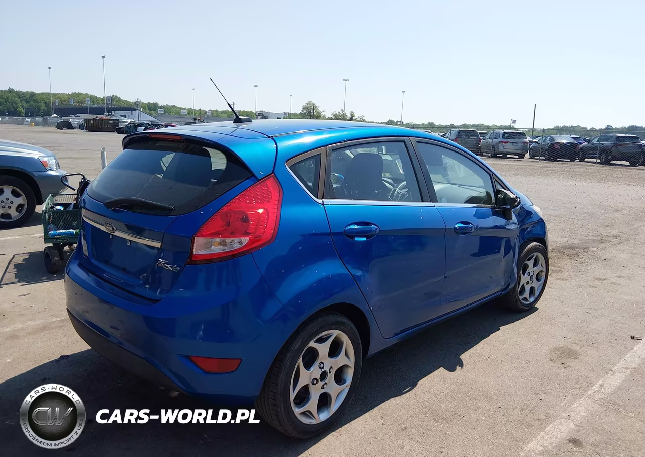 2011 Ford Fiesta Ses VIN:3FADP4FJ5BM115459 - 4