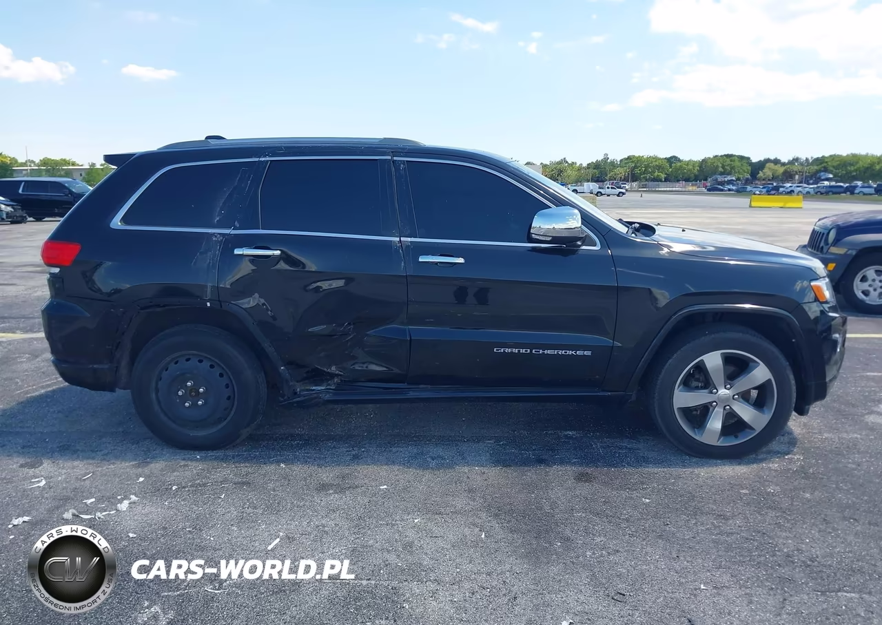 2015 Jeep Grand Cherokee Overland VIN:1C4RJECG0FC646737 - 13