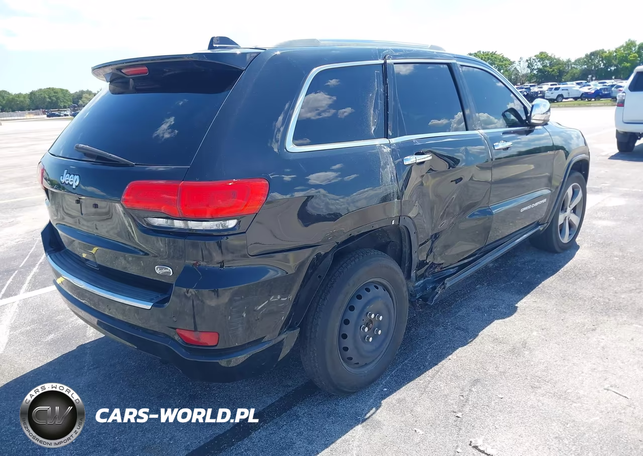 2015 Jeep Grand Cherokee Overland VIN:1C4RJECG0FC646737 - 4