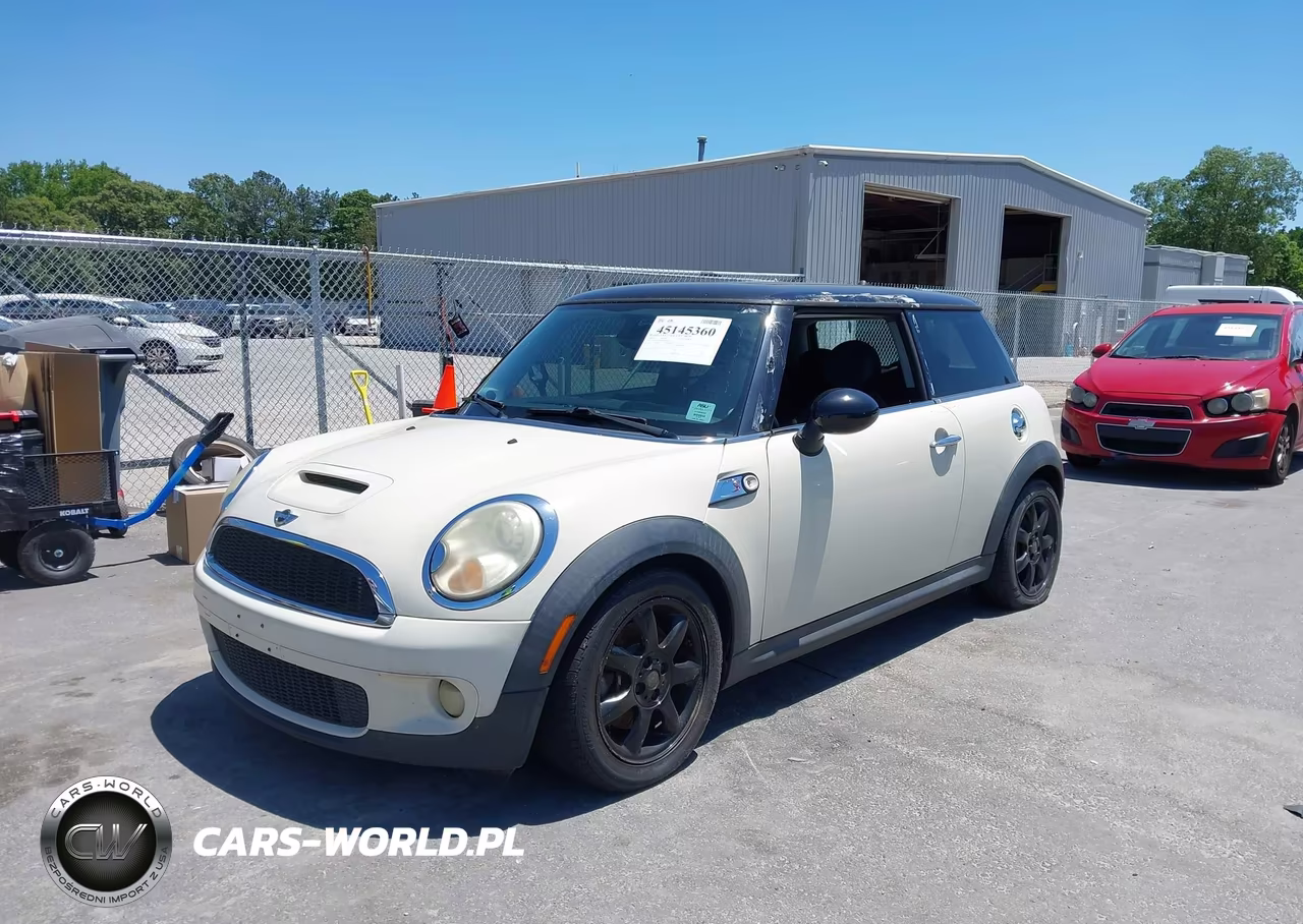 2009 Mini Cooper S VIN:WMWMF73599TW85933 - 2