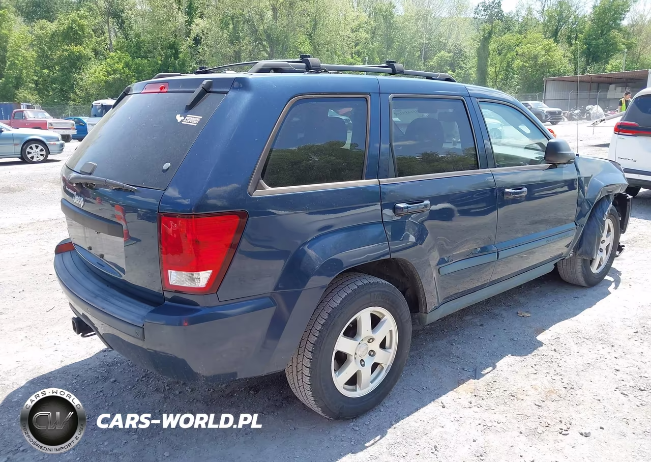 2009 Jeep Grand Cherokee Laredo VIN:1J8HR48P59C541034 - 4