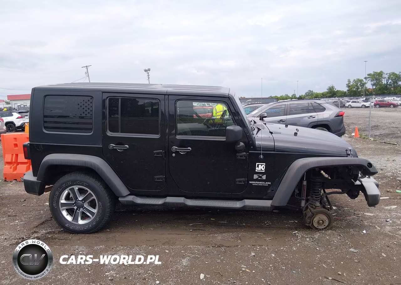 2009 Jeep Wrangler Unlimited X VIN:1J4GA39169L768497 - 13