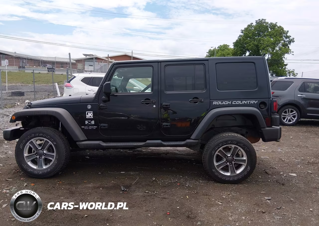 2009 Jeep Wrangler Unlimited X VIN:1J4GA39169L768497 - 14