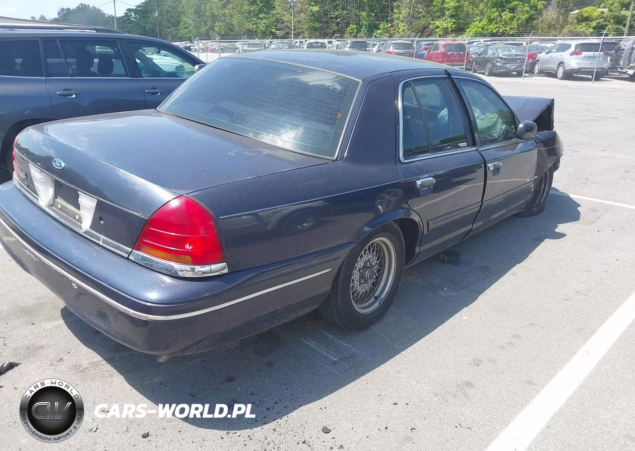 1999 Ford Crown Victoria VIN:2FAFP73W7XX137095 - 4