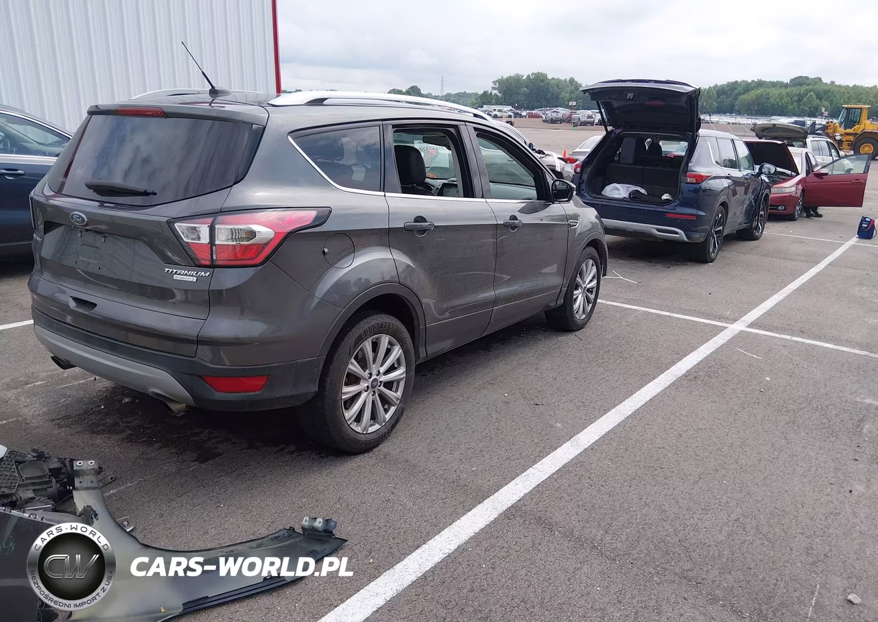 2017 Ford Escape Titanium VIN:1FMCU0JD2HUB73781 - 4