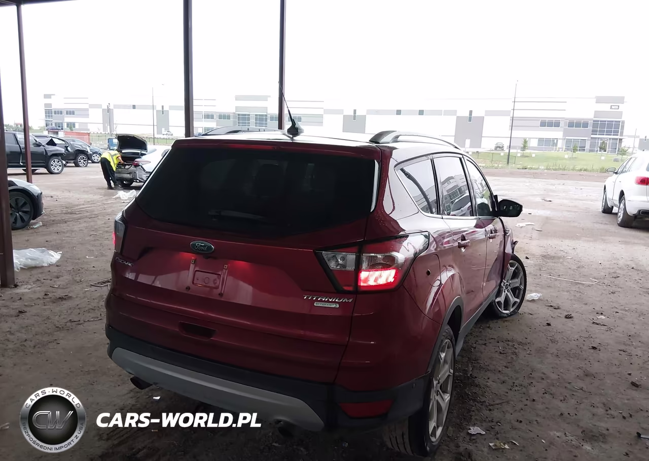 2018 Ford Escape Titanium VIN:1FMCU0J99JUD54748 - 4