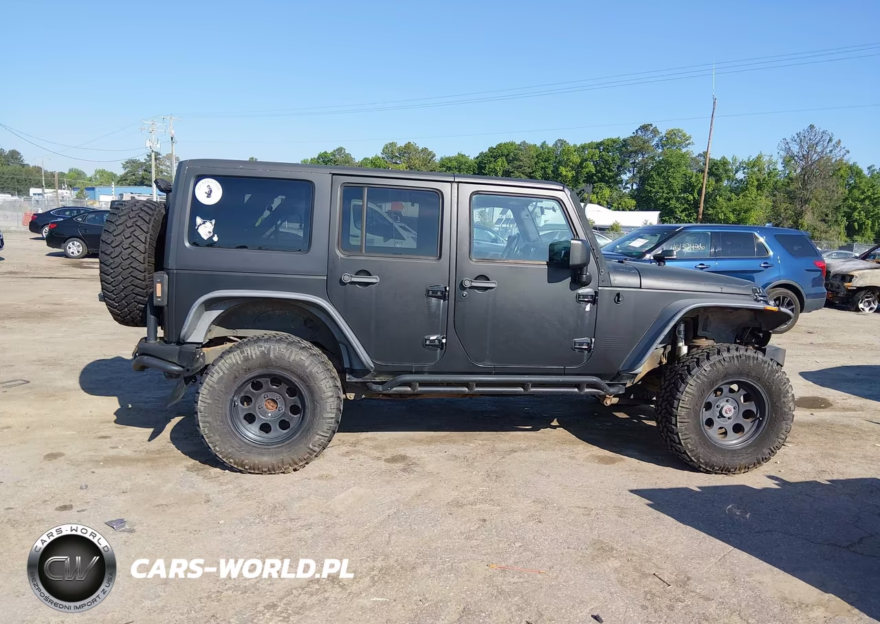 2012 Jeep Wrangler Unlimited Rubicon VIN:1C4BJWFG1CL165281 - 13