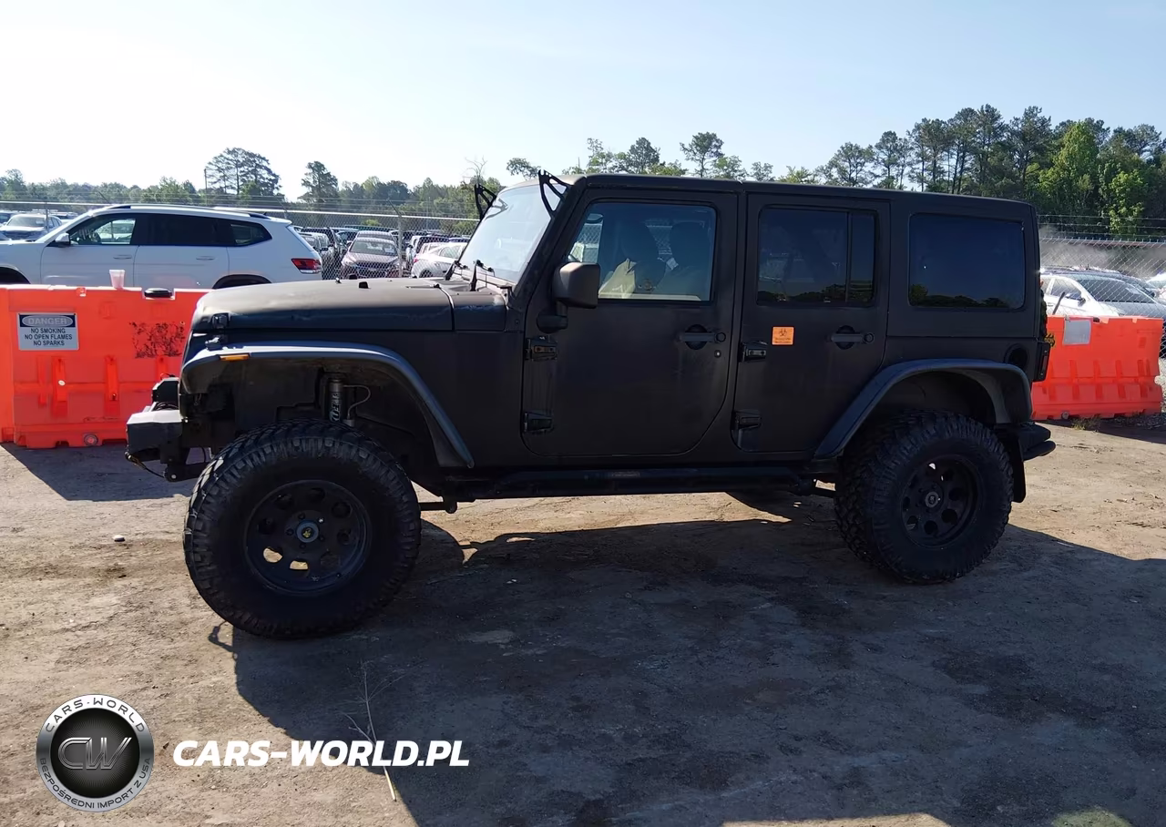 2012 Jeep Wrangler Unlimited Rubicon VIN:1C4BJWFG1CL165281 - 14