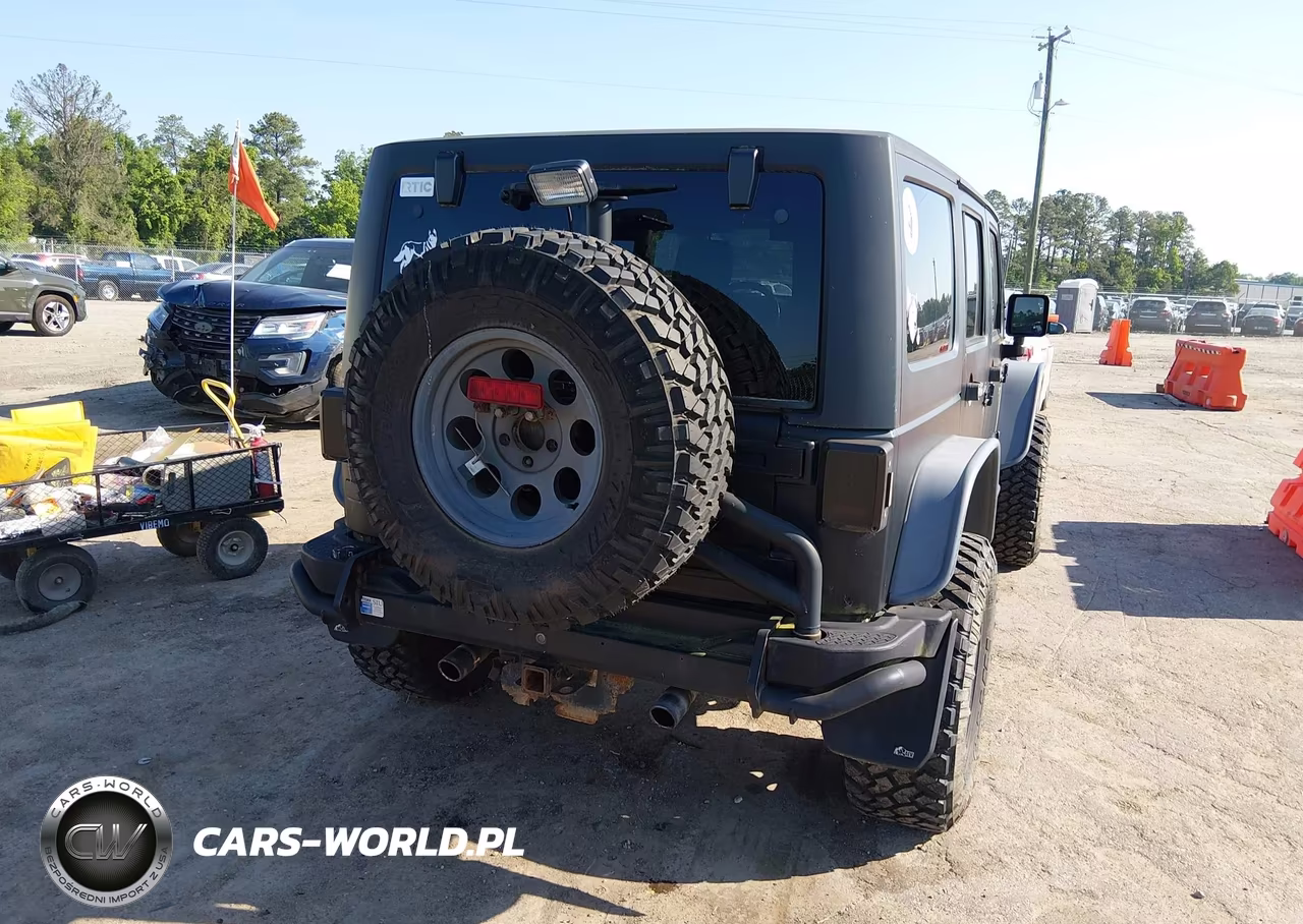 2012 Jeep Wrangler Unlimited Rubicon VIN:1C4BJWFG1CL165281 - 4