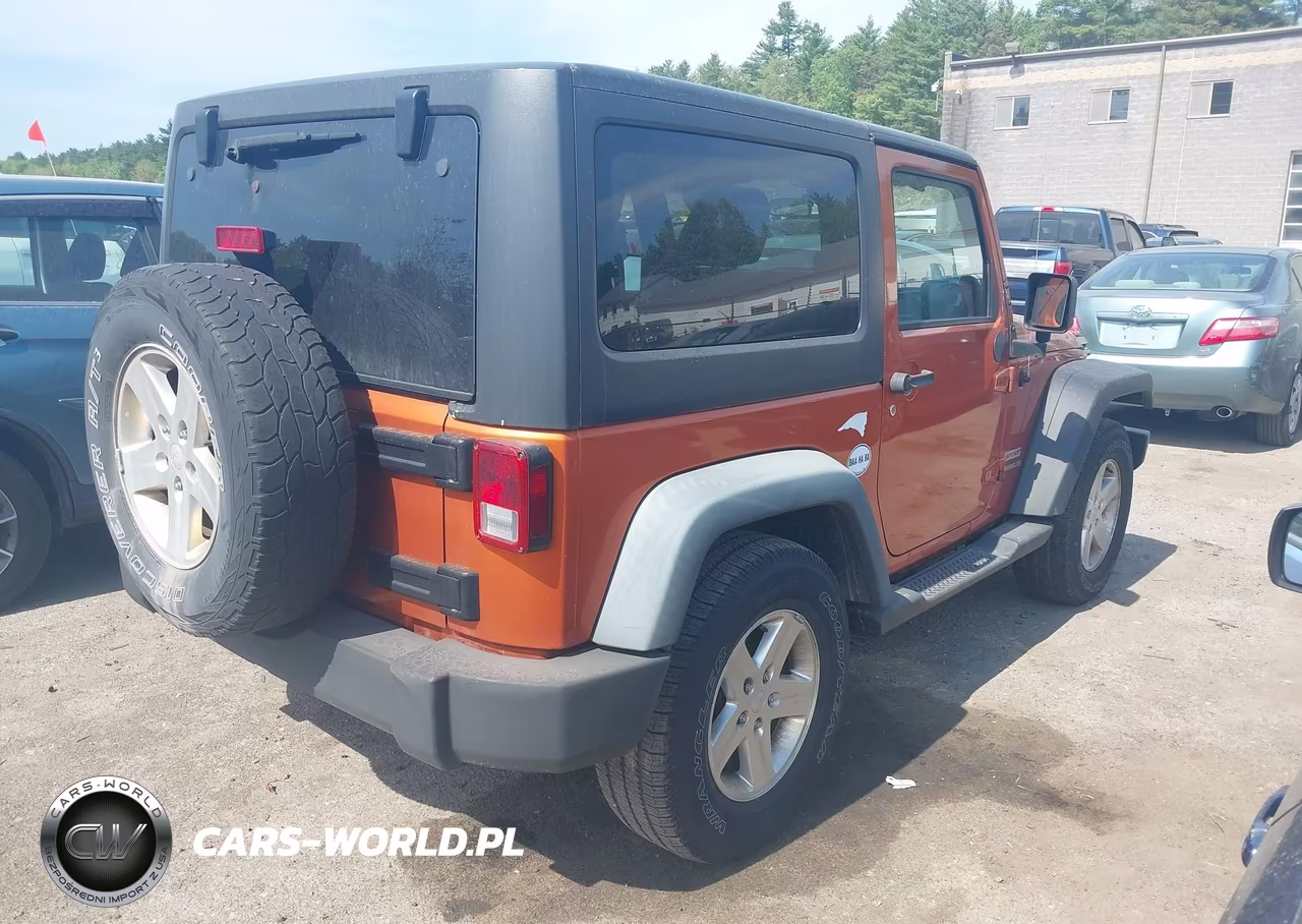2011 Jeep Wrangler Sport VIN:1J4AA2D14BL508872 - 4