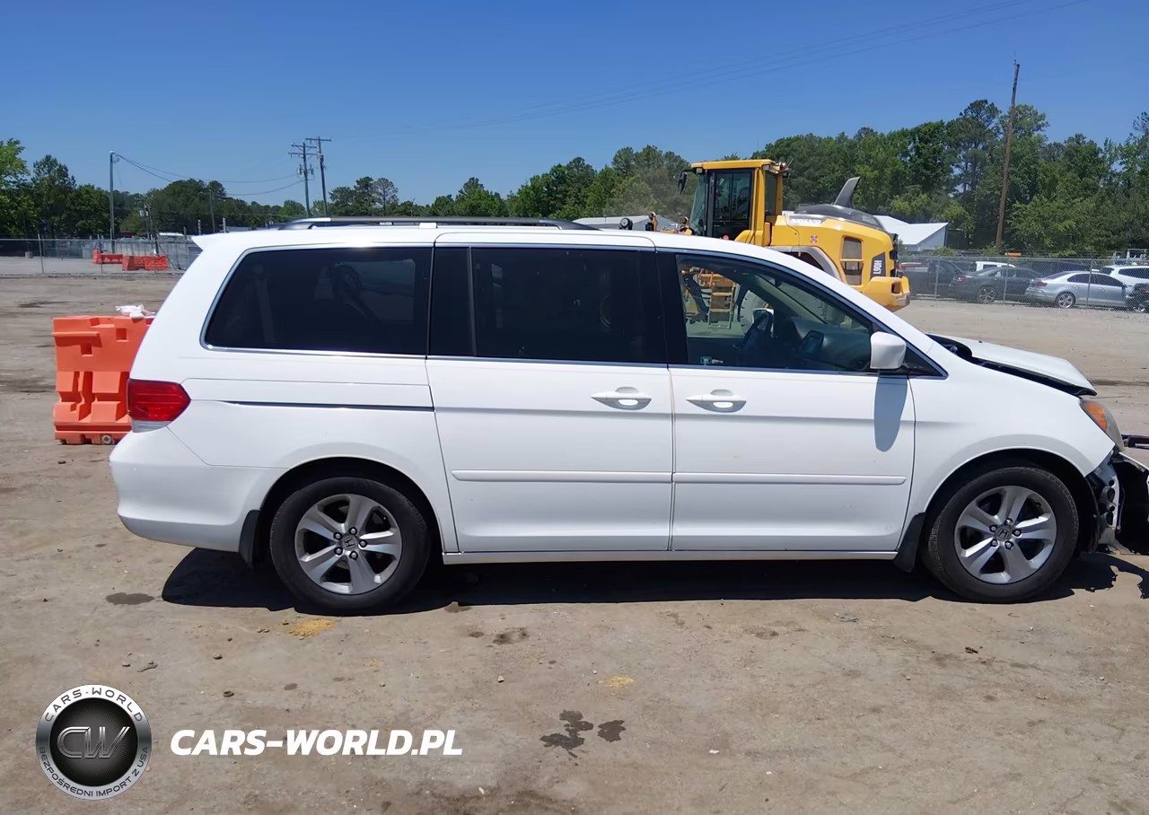 2010 Honda Odyssey Touring VIN:5FNRL3H90AB037250 - 13