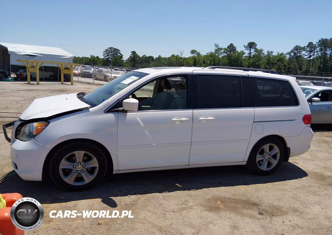 2010 Honda Odyssey Touring VIN:5FNRL3H90AB037250 - 14