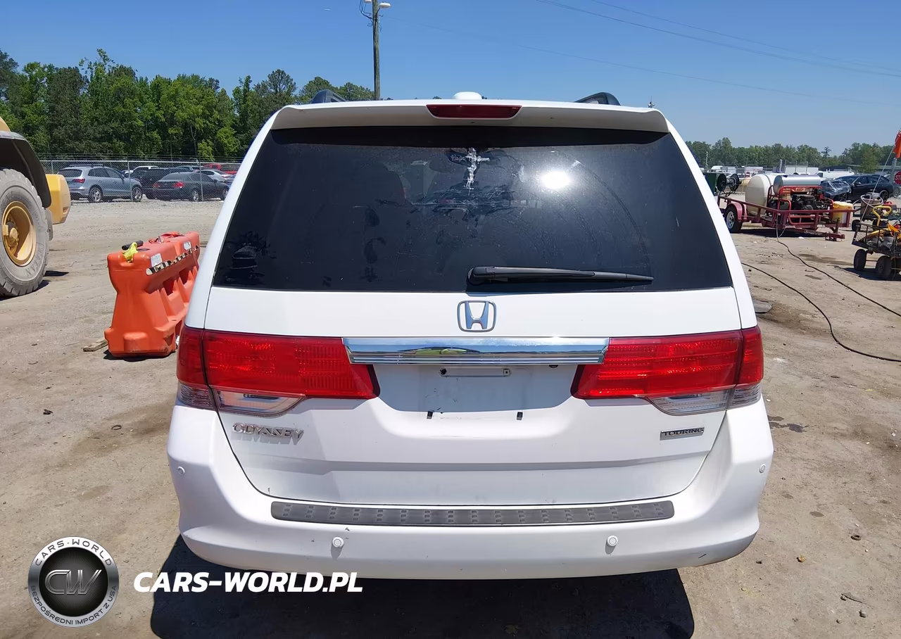 2010 Honda Odyssey Touring VIN:5FNRL3H90AB037250 - 16