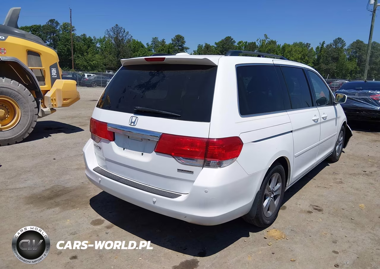 2010 Honda Odyssey Touring VIN:5FNRL3H90AB037250 - 4