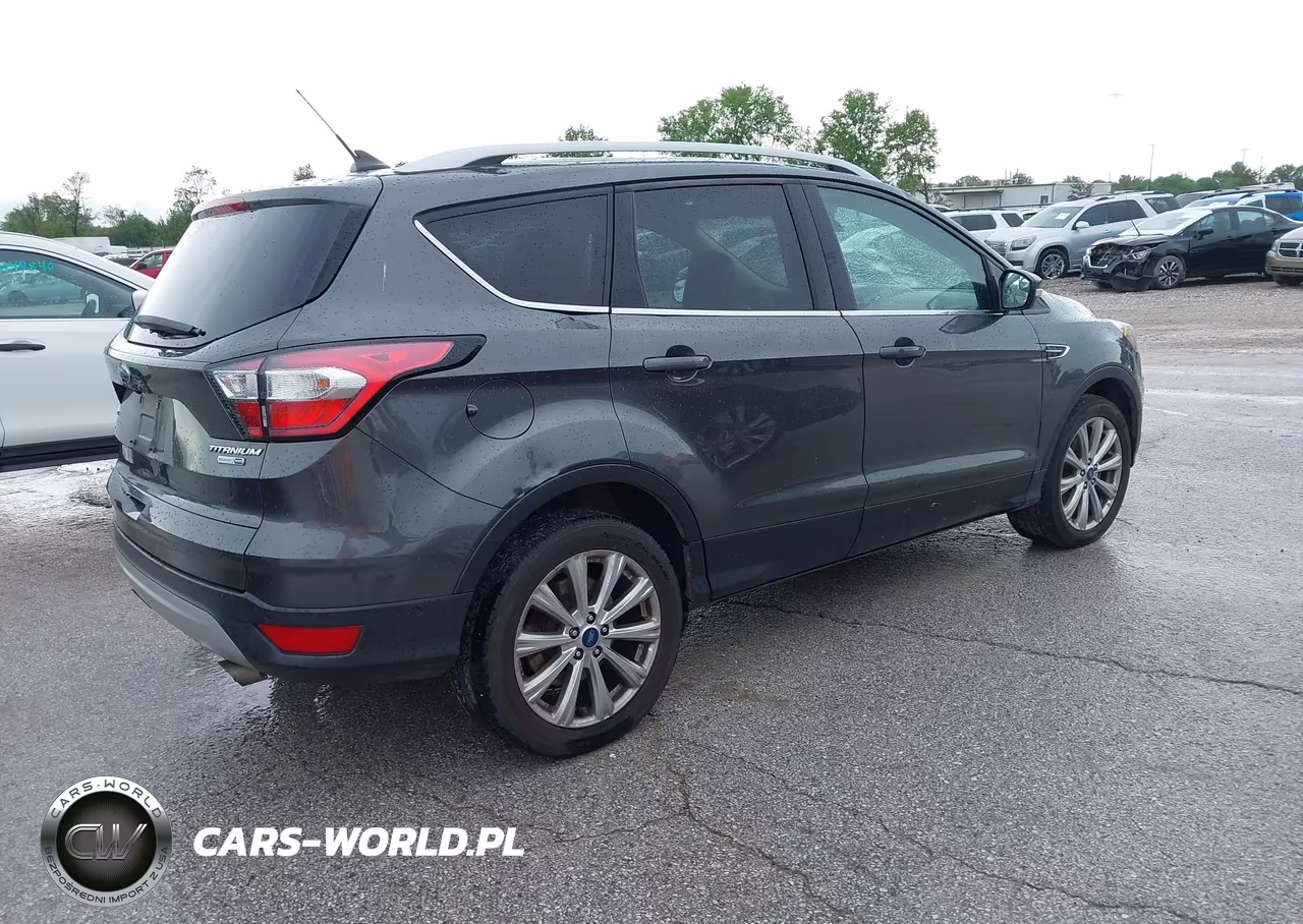2018 Ford Escape Titanium VIN:1FMCU9J9XJUC89395 - 4