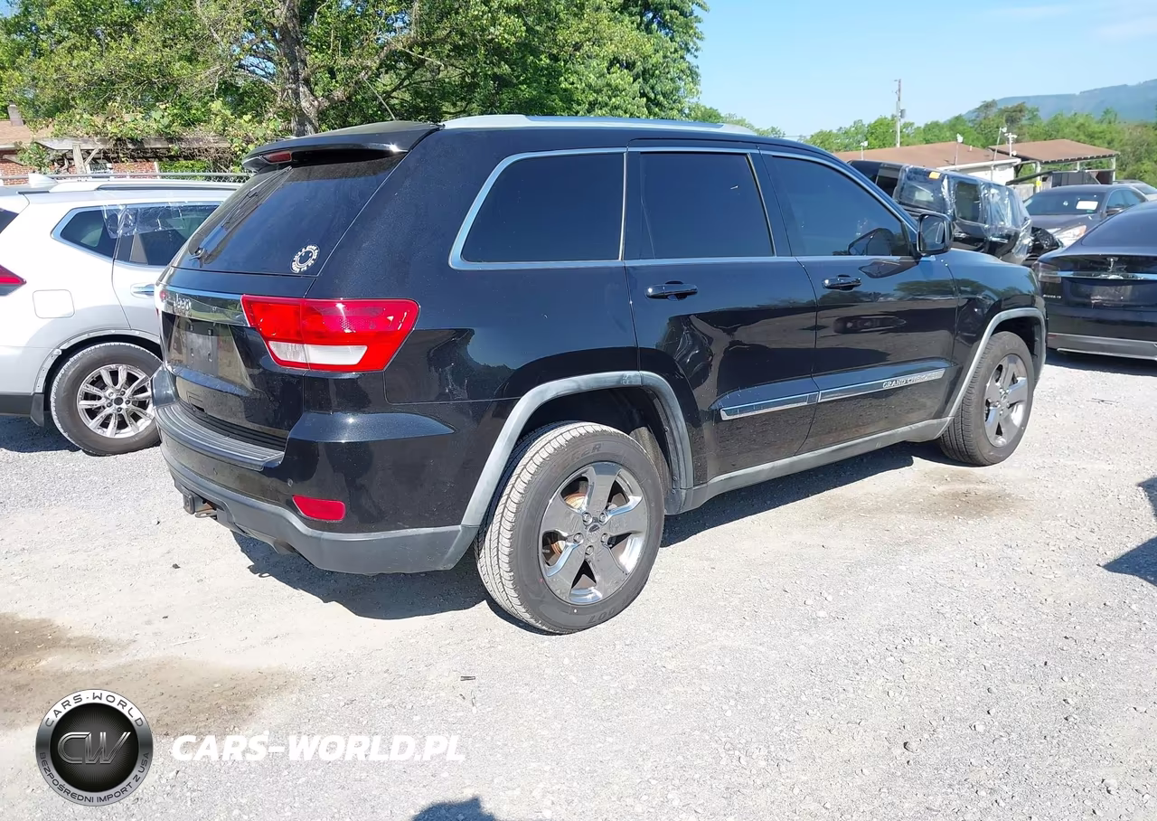2011 Jeep Grand Cherokee Laredo VIN:1J4RR4GG8BC590211 - 4