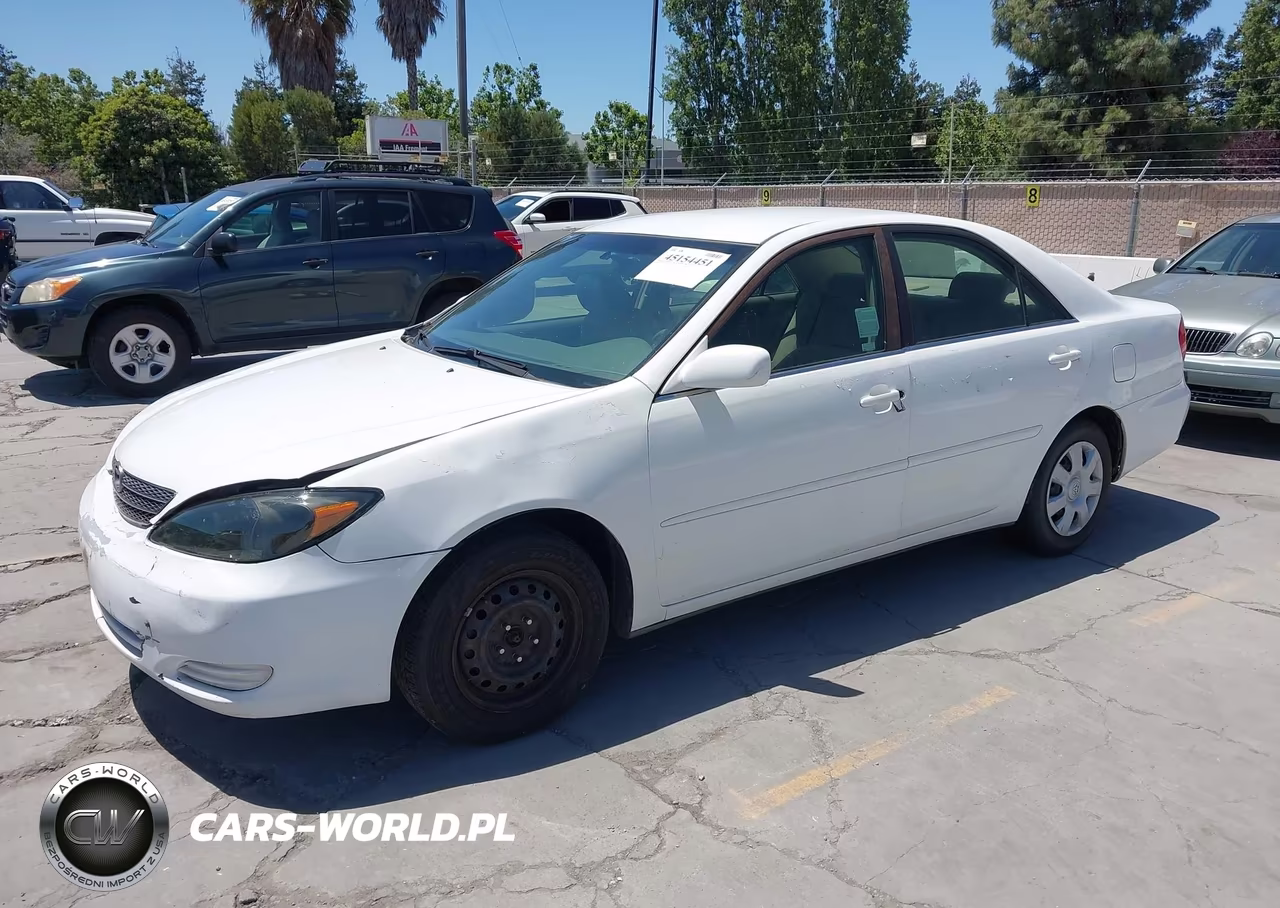 2002 Toyota Camry Le VIN:JTDBE30K920055322 - 2