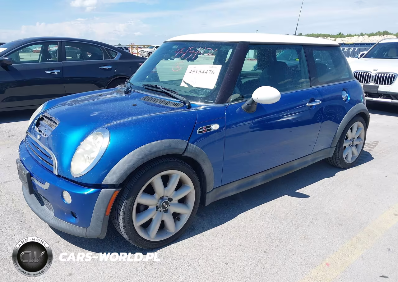 2006 Mini Cooper S VIN:WMWRE33536TJ48519 - 2