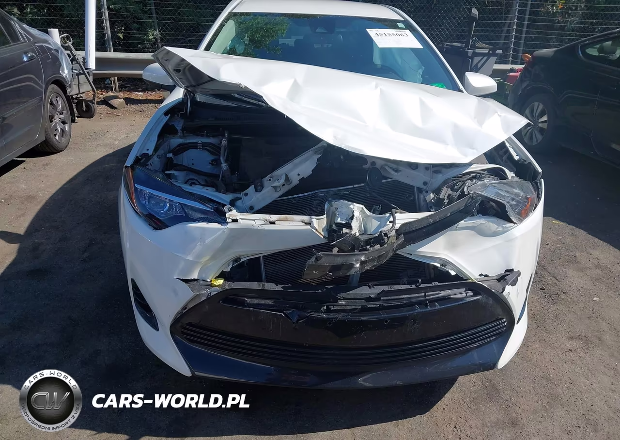 2018 Toyota Corolla Le VIN:5YFBURHE6JP748437 - 12