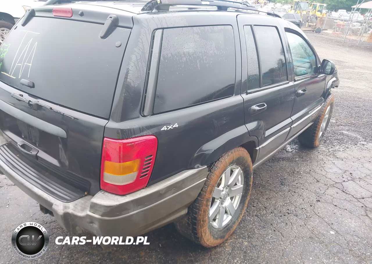 1999 Jeep Grand Cherokee Laredo VIN:1J4GW58S7XC751373 - 4
