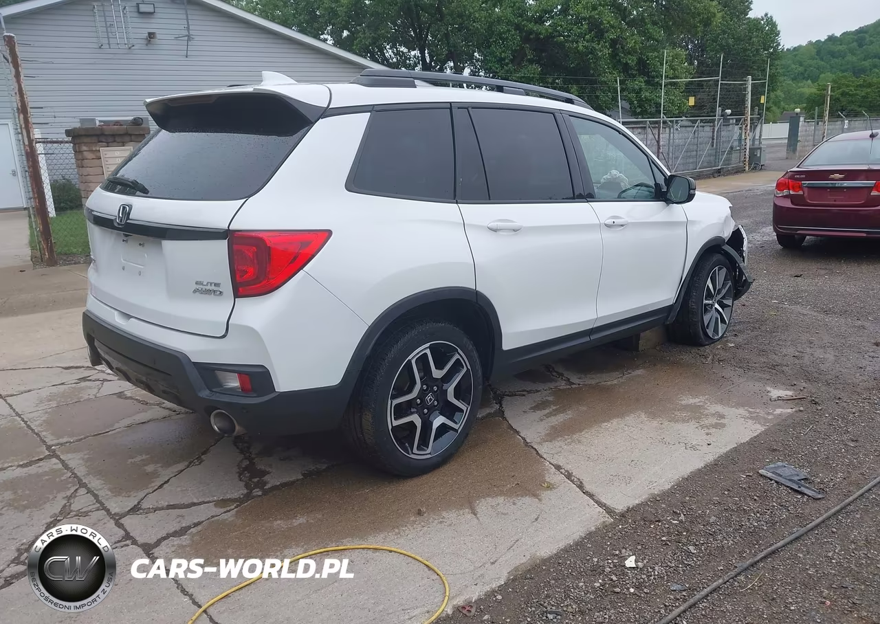 2022 Honda Passport Awd Elite VIN:5FNYF8H05NB030057 - 4