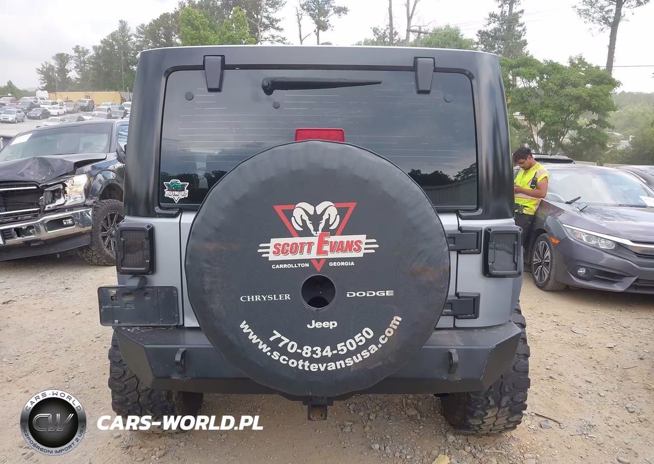 2013 Jeep Wrangler Unlimited Sport VIN:1C4BJWDG3DL545601 - 16
