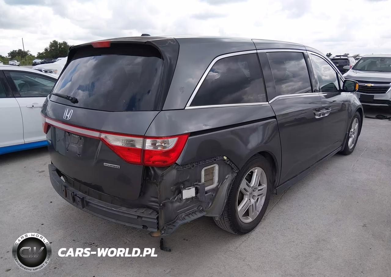 2012 Honda Odyssey Touring-Touring Elite VIN:5FNRL5H99CB044602 - 4