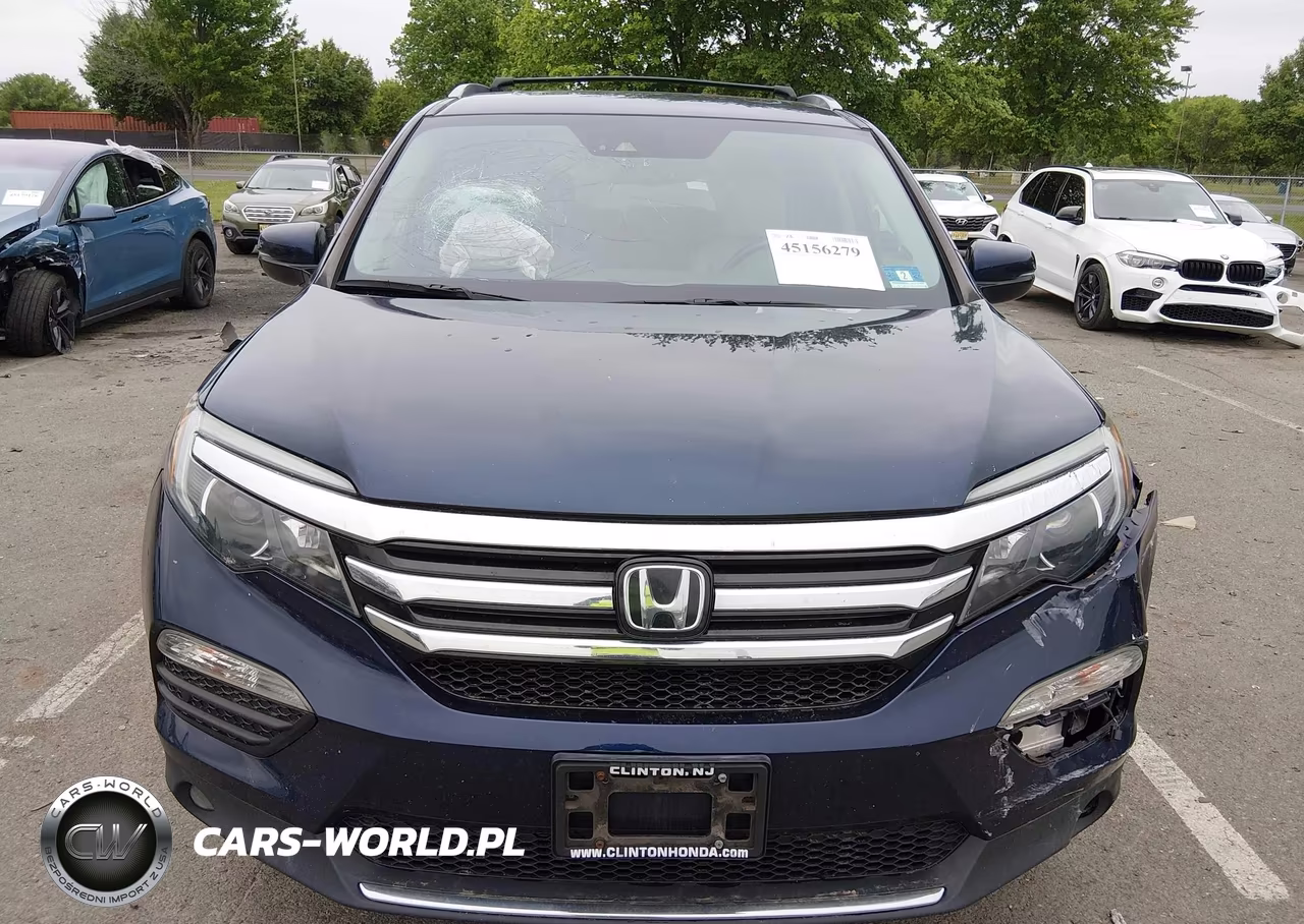 2018 Honda Pilot Elite VIN:5FNYF6H07JB000153 - 12