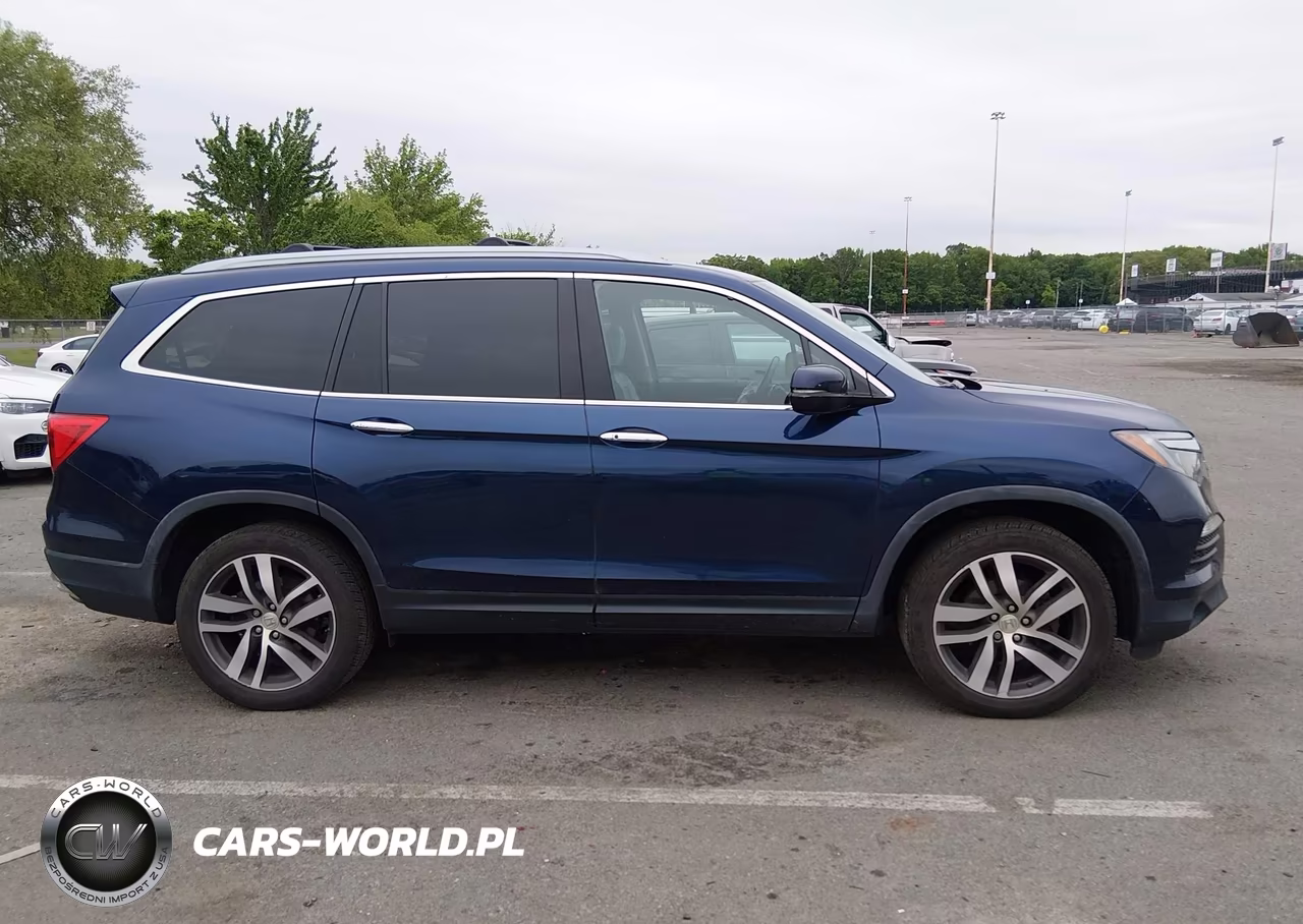 2018 Honda Pilot Elite VIN:5FNYF6H07JB000153 - 13