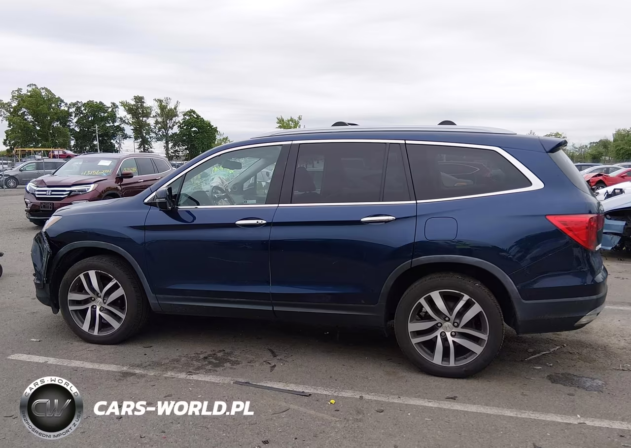 2018 Honda Pilot Elite VIN:5FNYF6H07JB000153 - 14