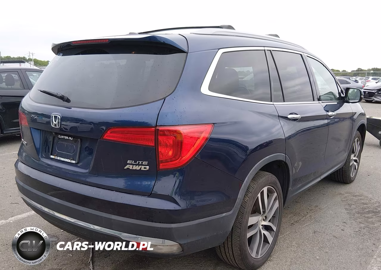 2018 Honda Pilot Elite VIN:5FNYF6H07JB000153 - 4