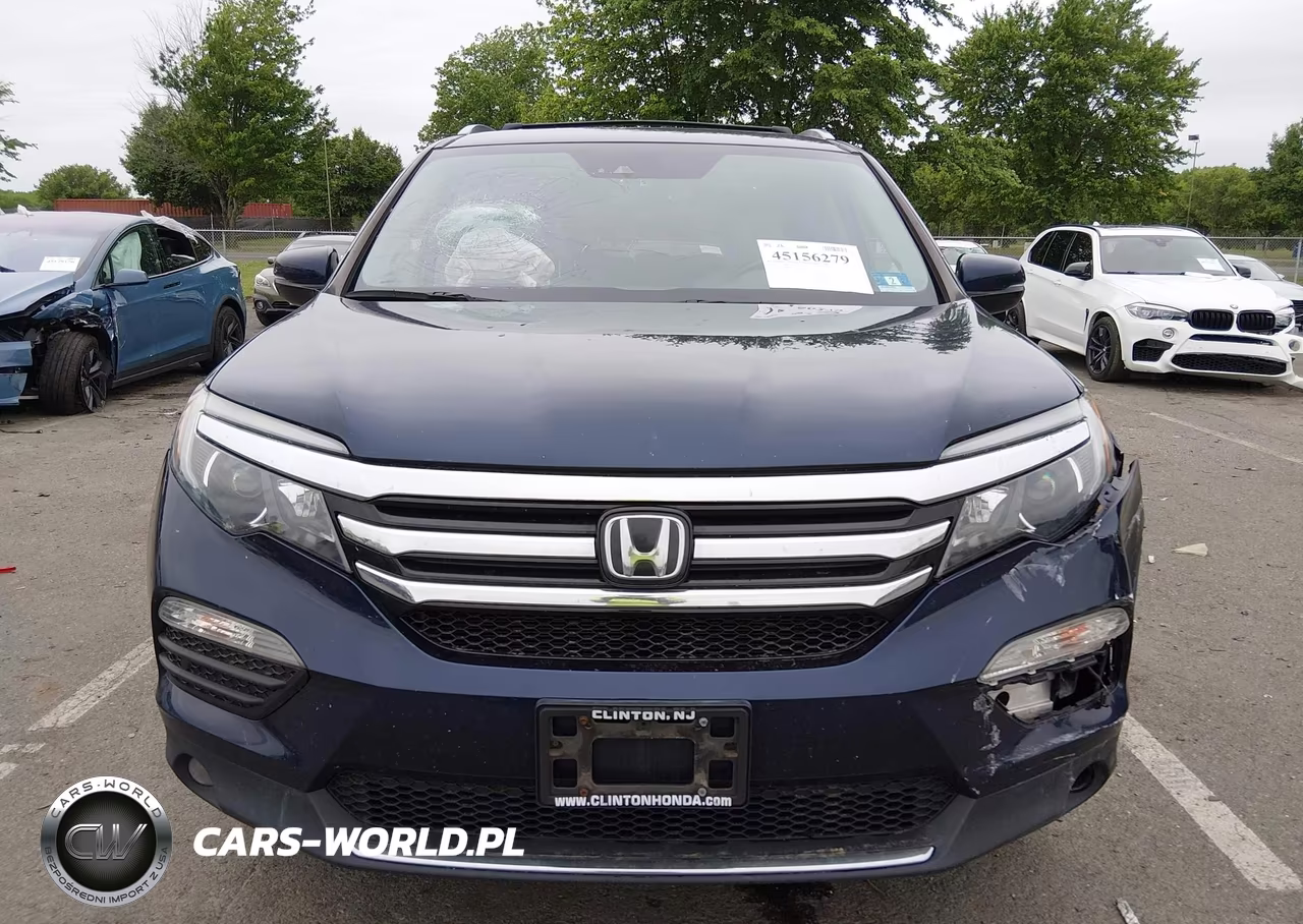 2018 Honda Pilot Elite VIN:5FNYF6H07JB000153 - 6