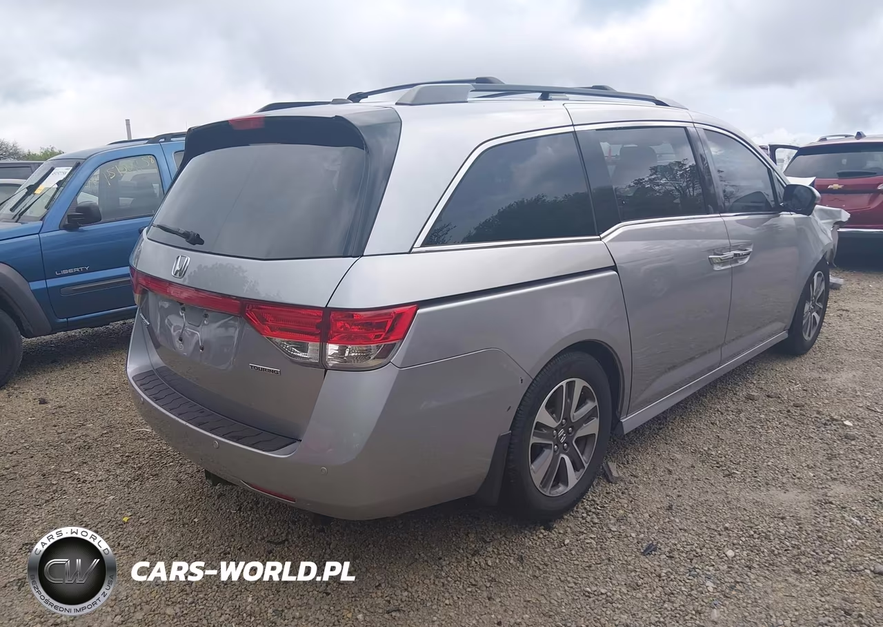 2016 Honda Odyssey Touring-Touring Elite VIN:5FNRL5H91GB095694 - 4