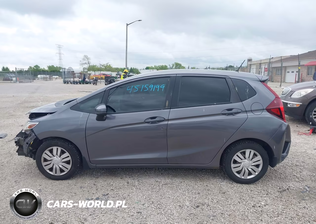 2015 Honda Fit Lx VIN:3HGGK5H56FM755506 - 14