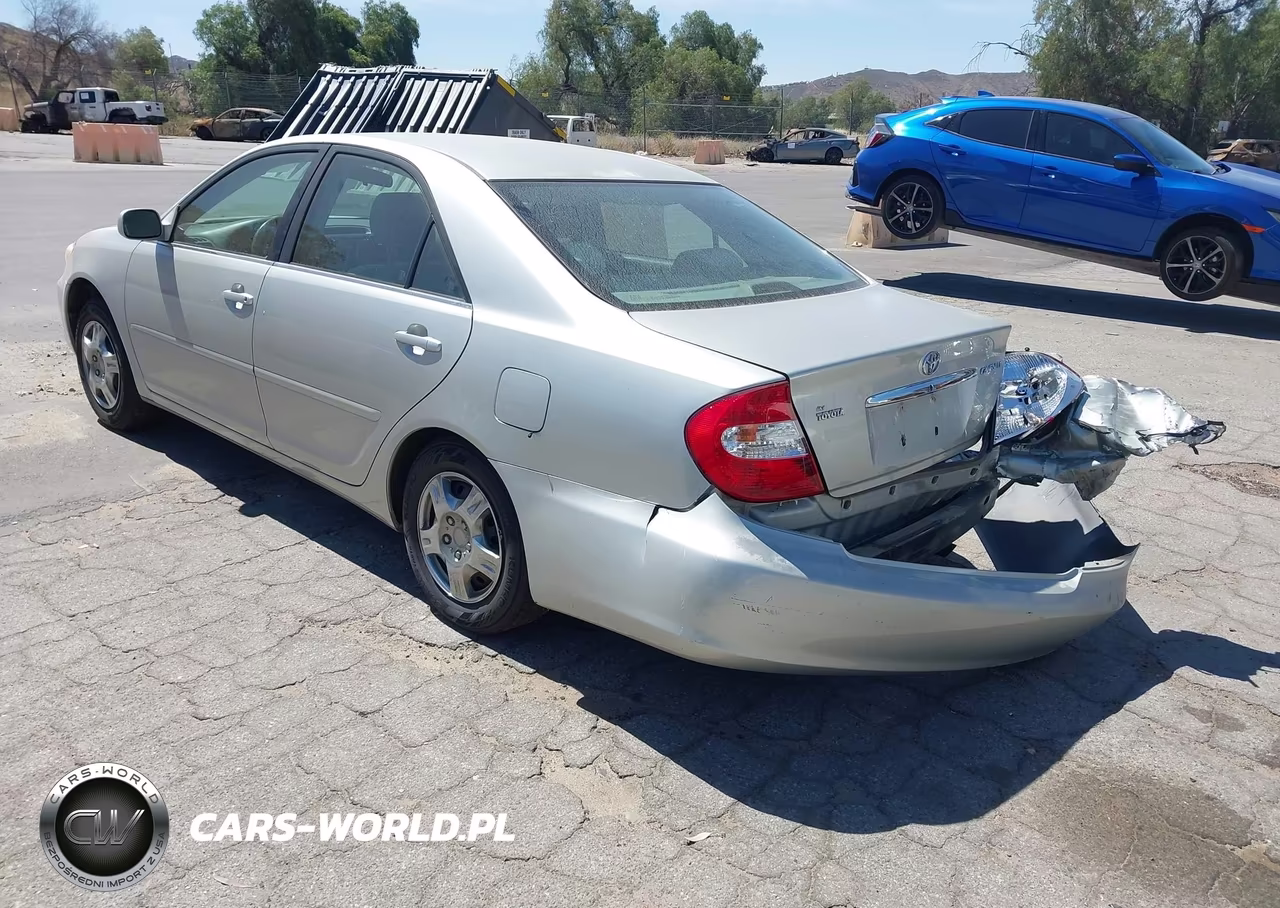 2003 Toyota Camry Le VIN:JTDBE32K030238994 - 3
