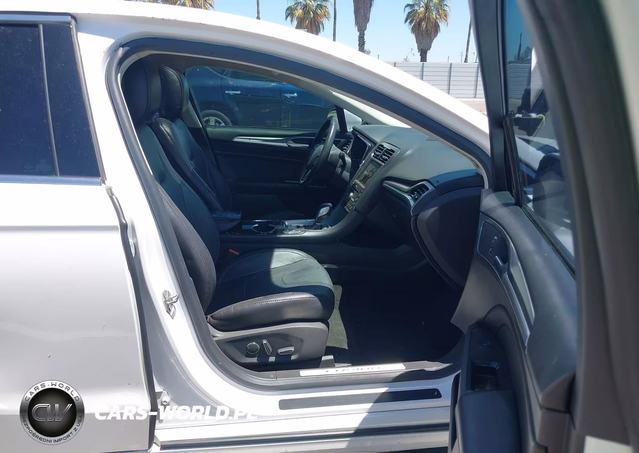 2016 Ford Fusion Energi Titanium VIN:3FA6P0SU2GR115866 - 5