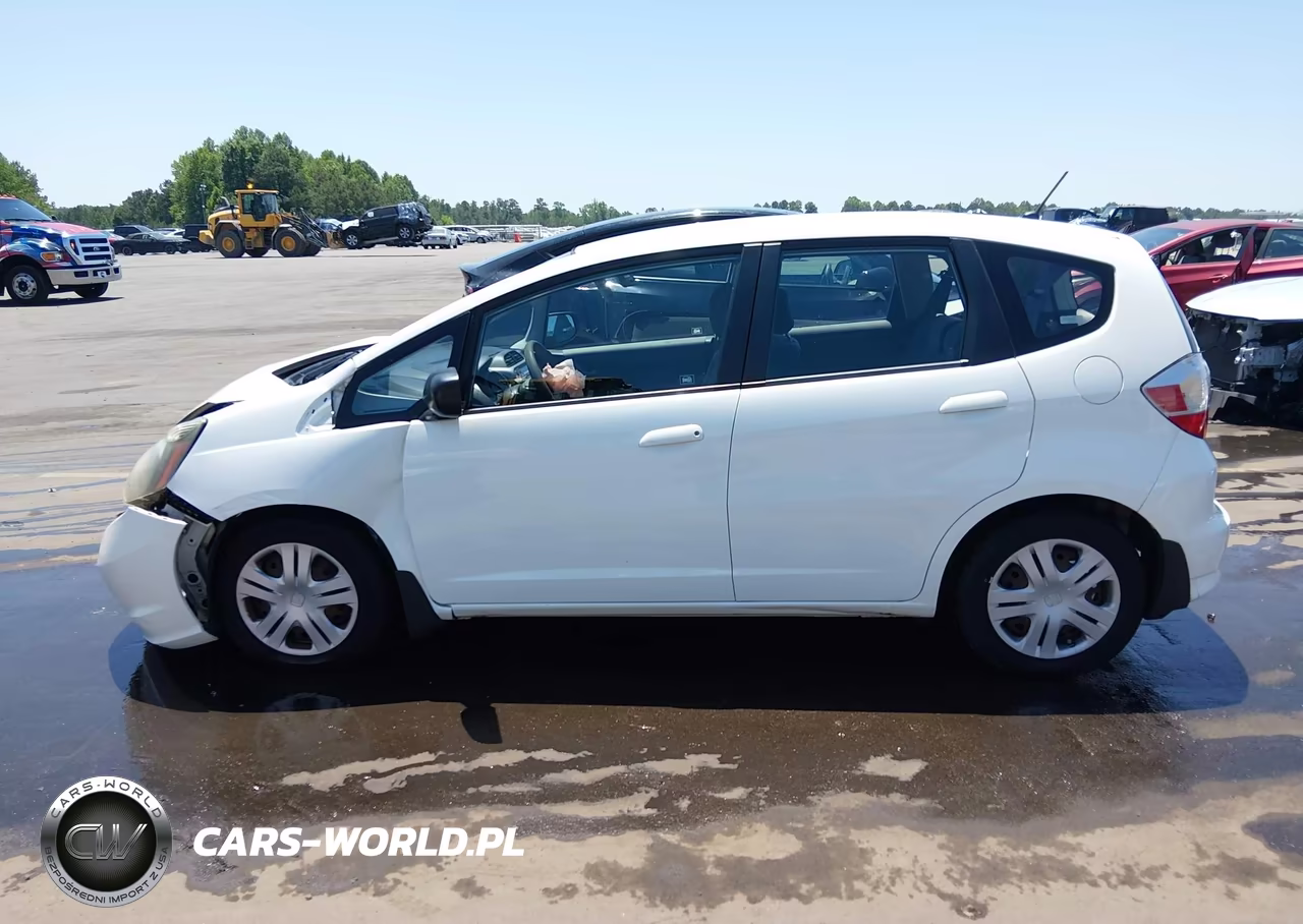 2009 Honda Fit VIN:JHMGE88299C006054 - 14
