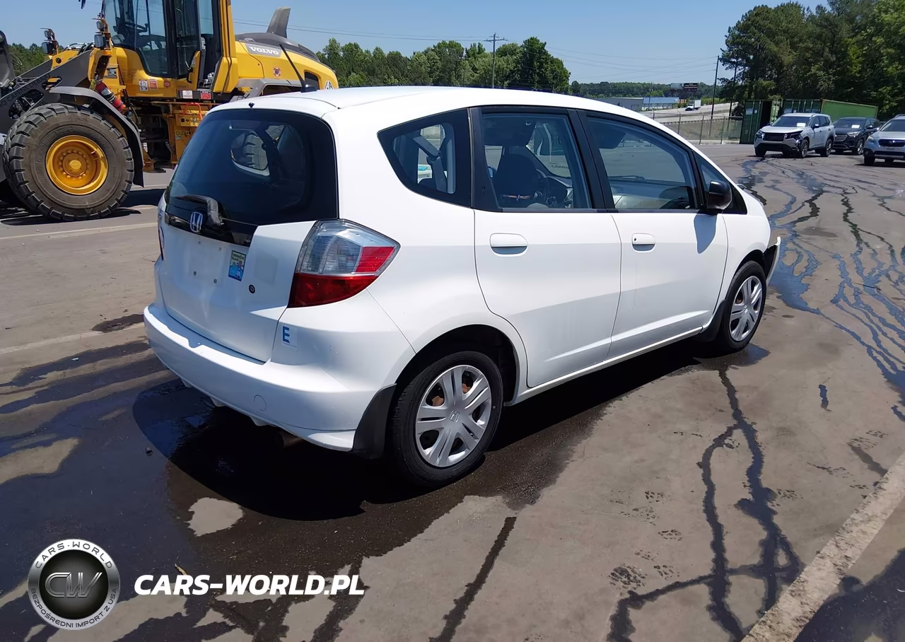 2009 Honda Fit VIN:JHMGE88299C006054 - 4