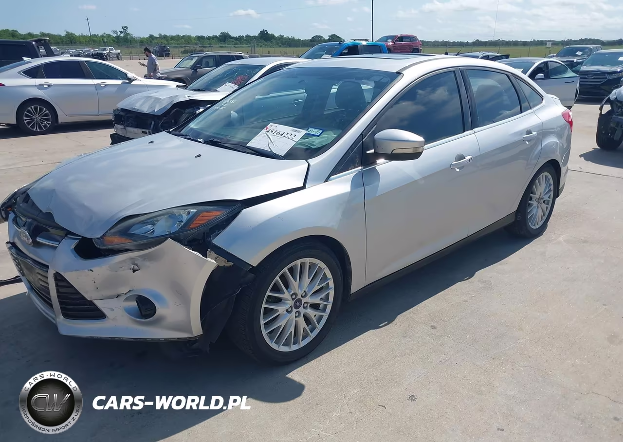 2014 Ford Focus Titanium VIN:1FADP3J20EL310272 - 2