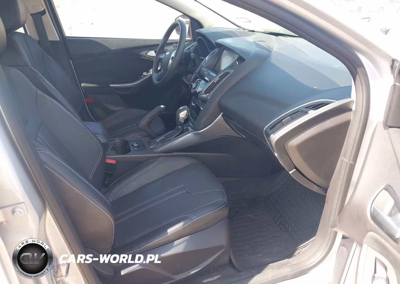 2014 Ford Focus Titanium VIN:1FADP3J20EL310272 - 5