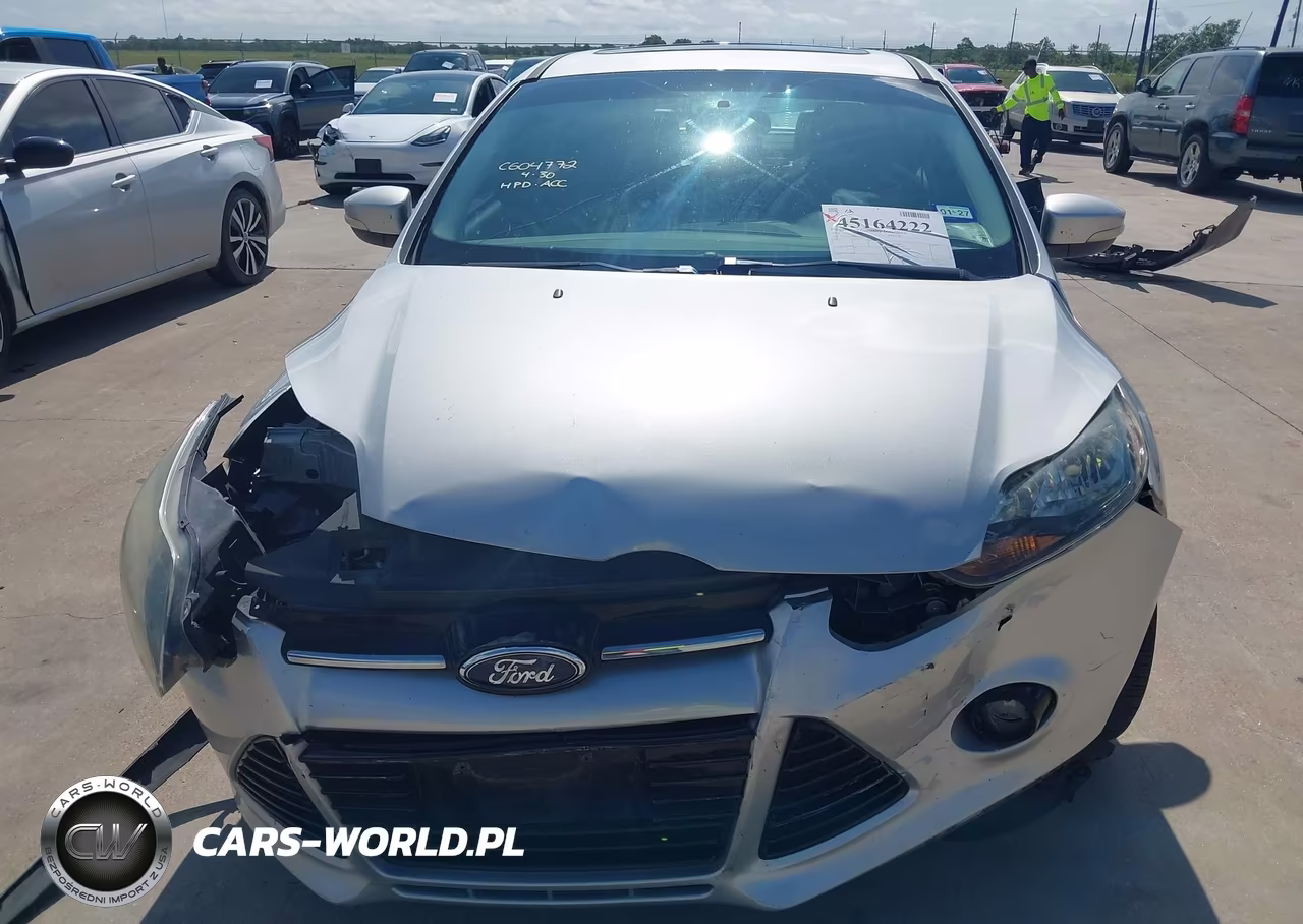 2014 Ford Focus Titanium VIN:1FADP3J20EL310272 - 6