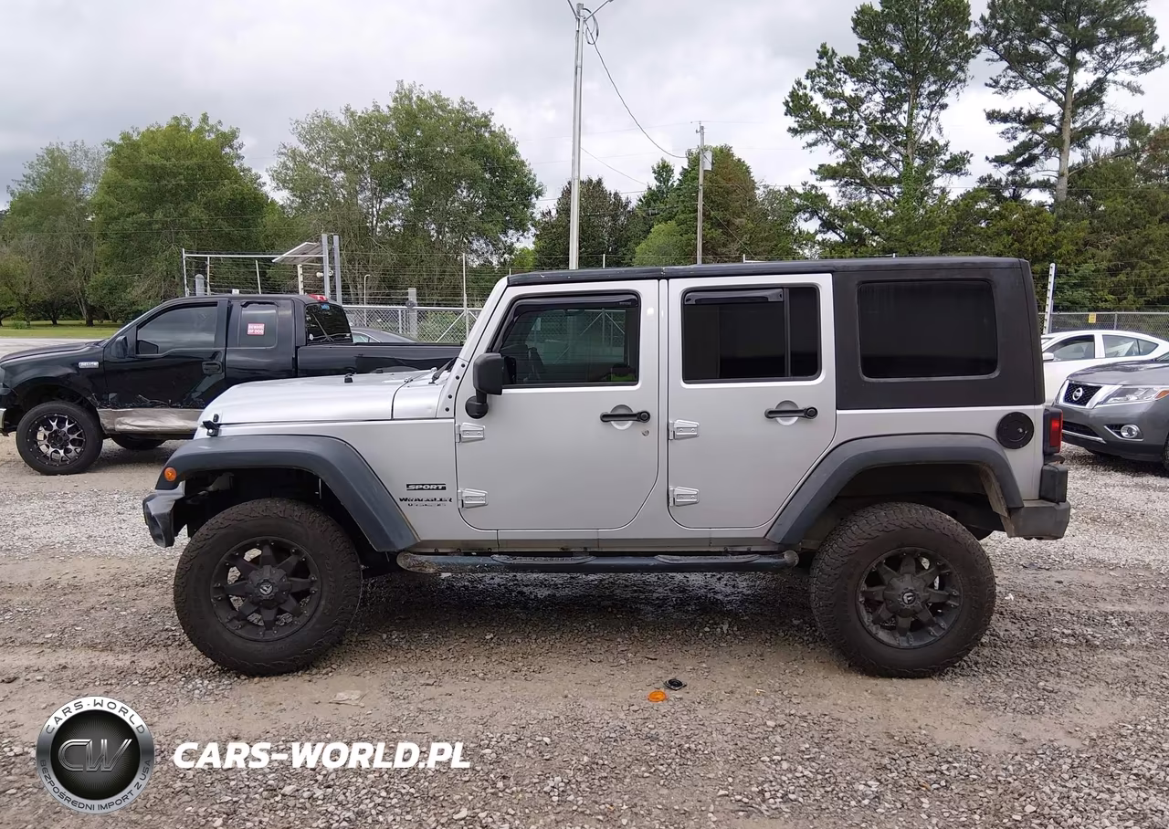 2010 Jeep Wrangler Unlimited Sport VIN:1J4BB3H14AL134604 - 14
