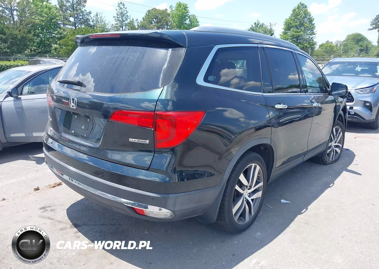 2016 Honda Pilot Touring VIN:5FNYF5H91GB054551 - 4