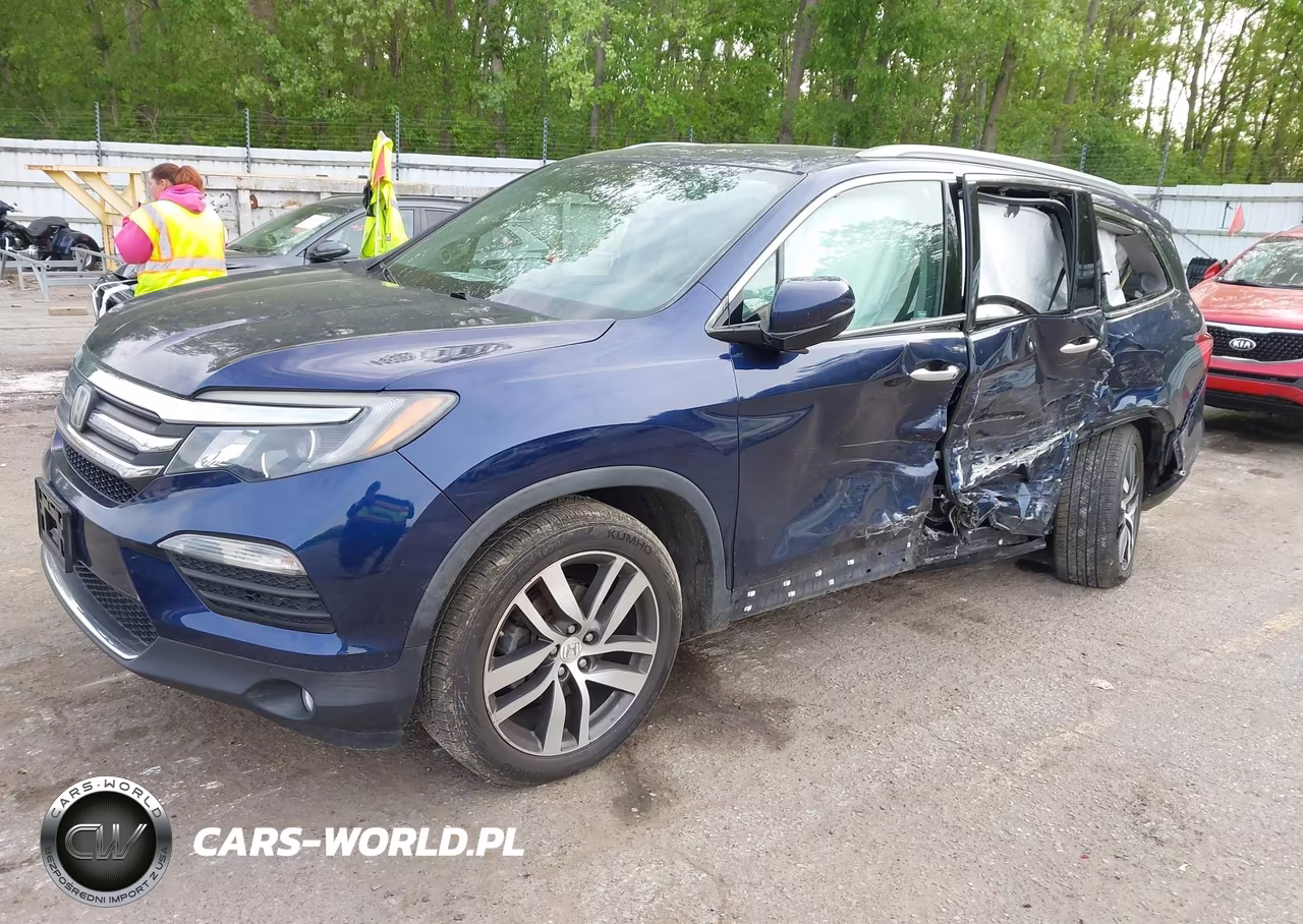 2018 Honda Pilot Elite VIN:5FNYF6H0XJB023233 - 2