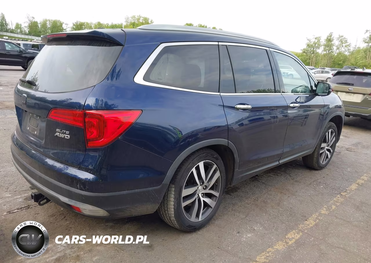 2018 Honda Pilot Elite VIN:5FNYF6H0XJB023233 - 4