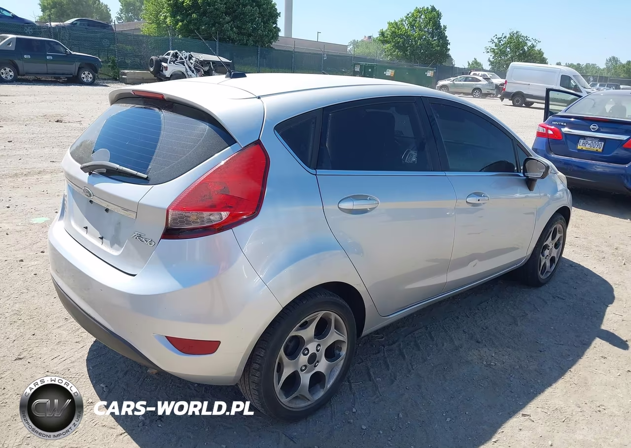 2011 Ford Fiesta Ses VIN:3FADP4FJ0BM147204 - 4
