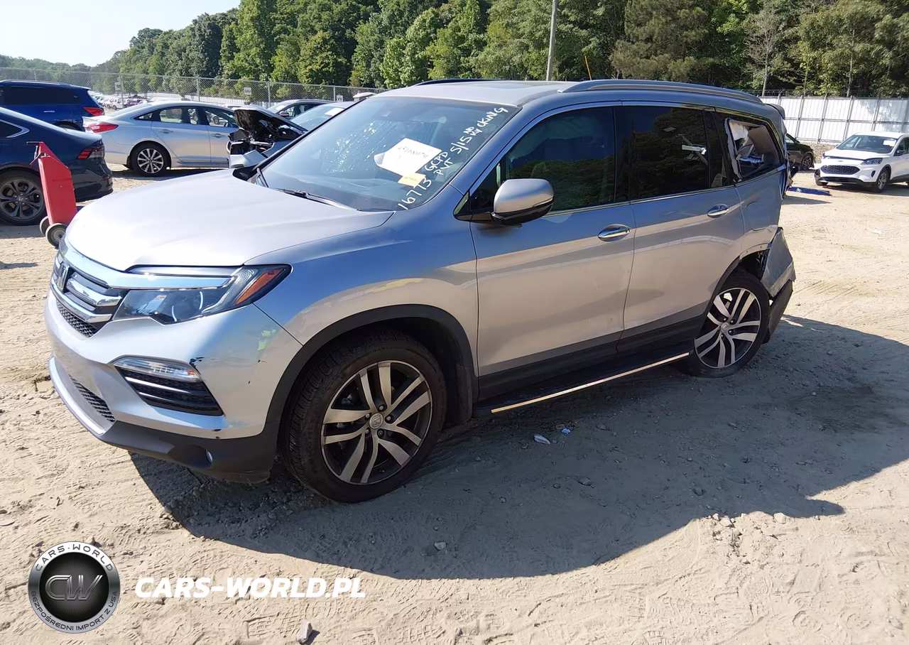 2018 Honda Pilot Touring VIN:5FNYF6H90JB056773 - 2