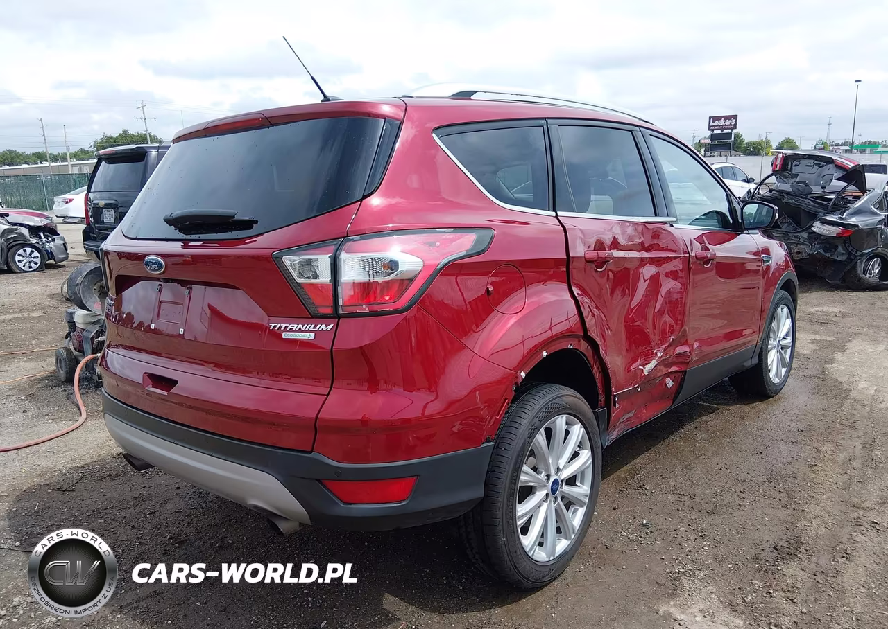 2017 Ford Escape Titanium VIN:1FMCU0J96HUA38962 - 4